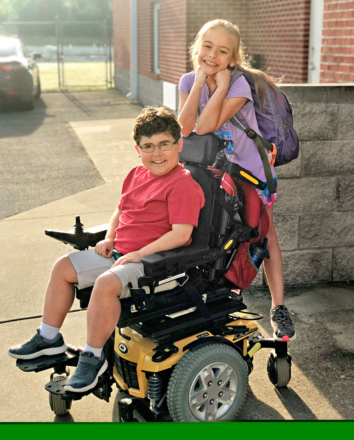 ethan lybrand in wheelchair with sister