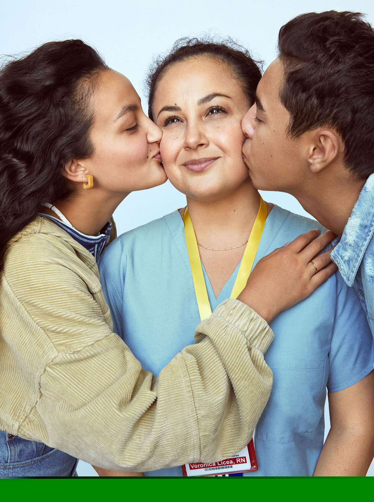 teens kissing mother and nurse Veronica Licea on cheek